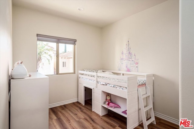 bedroom featuring light wood-type flooring