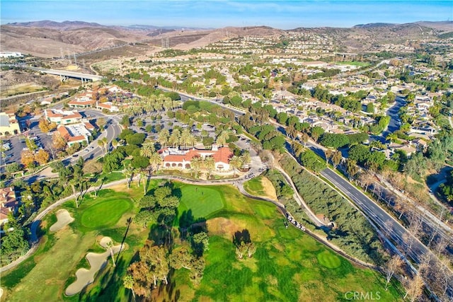 birds eye view of property featuring a mountain view