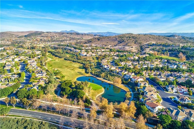 bird's eye view with a water and mountain view