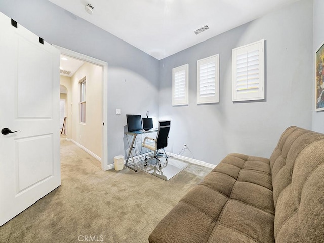 view of carpeted home office