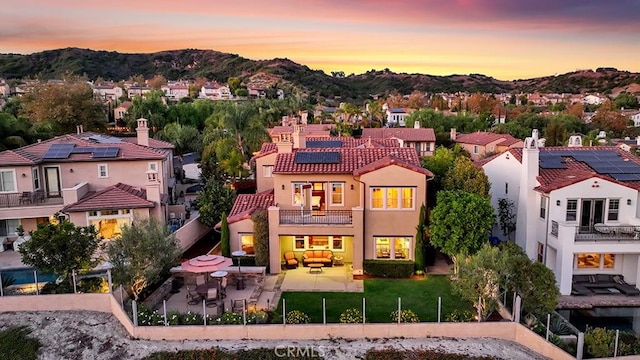 aerial view at dusk with a mountain view