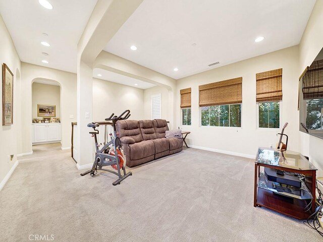 living room with light colored carpet