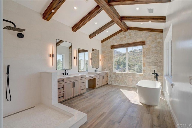 bathroom with beam ceiling, vanity, wood-type flooring, and shower with separate bathtub