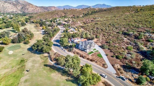 drone / aerial view featuring a mountain view