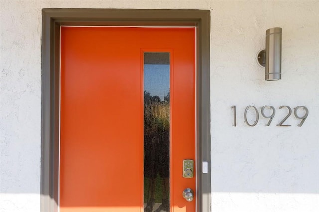 view of exterior entry with elevator