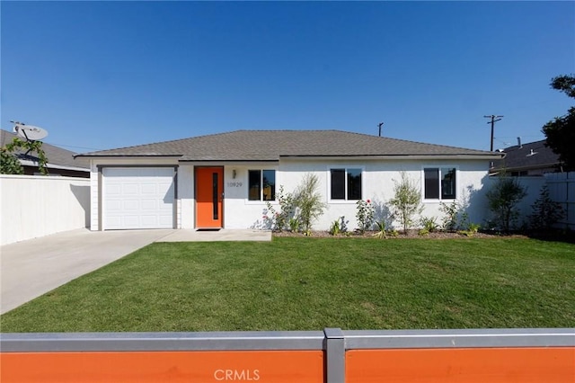 single story home with a garage and a front yard