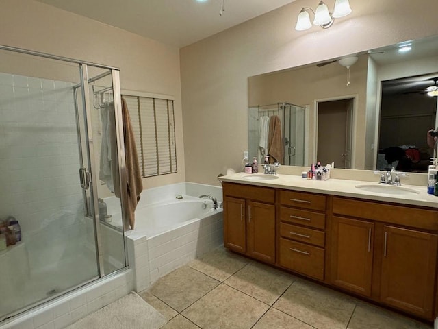 bathroom featuring shower with separate bathtub, vanity, tile patterned floors, and ceiling fan