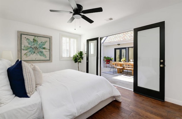 bedroom featuring french doors, ceiling fan, and dark hardwood / wood-style flooring