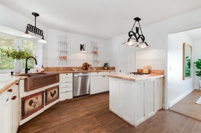 kitchen with dark wood-type flooring, sink, hanging light fixtures, dishwasher, and white cabinets