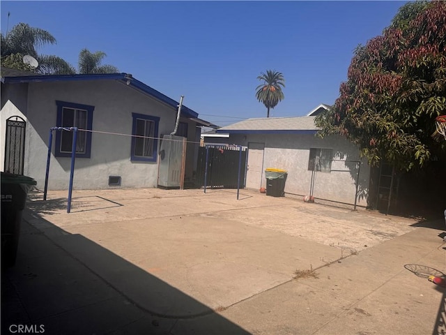 rear view of house featuring a patio area