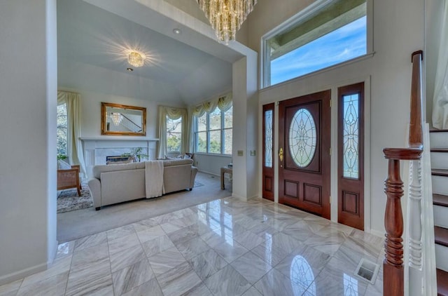 foyer featuring an inviting chandelier