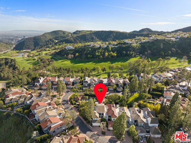 drone / aerial view featuring a mountain view