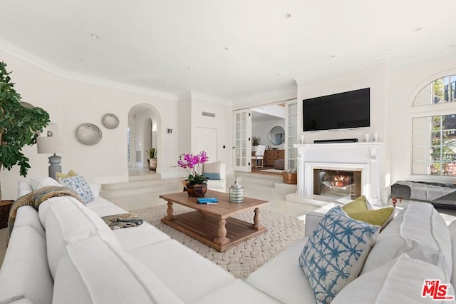 tiled living room featuring ornamental molding