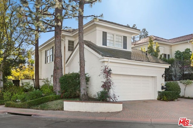 view of front of house with a garage