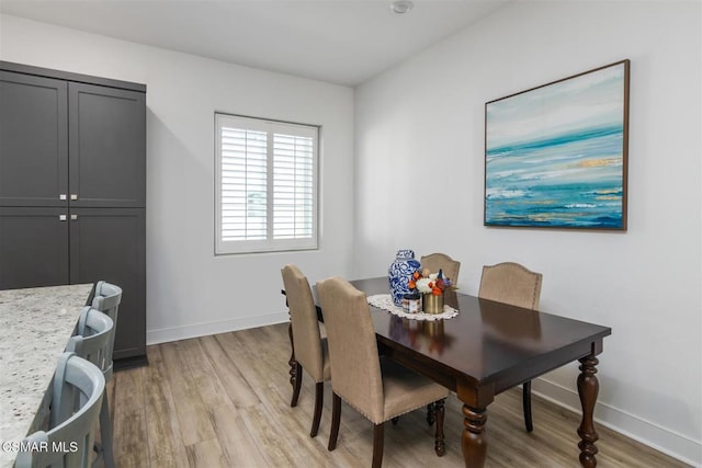 dining room featuring light wood-type flooring