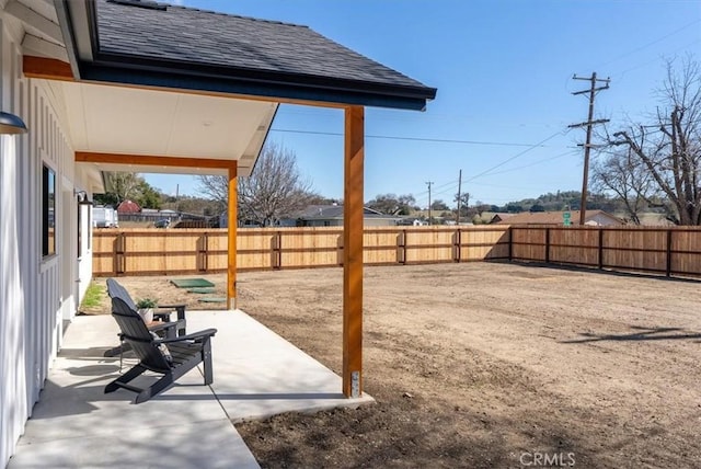 view of yard with a fenced backyard and a patio area