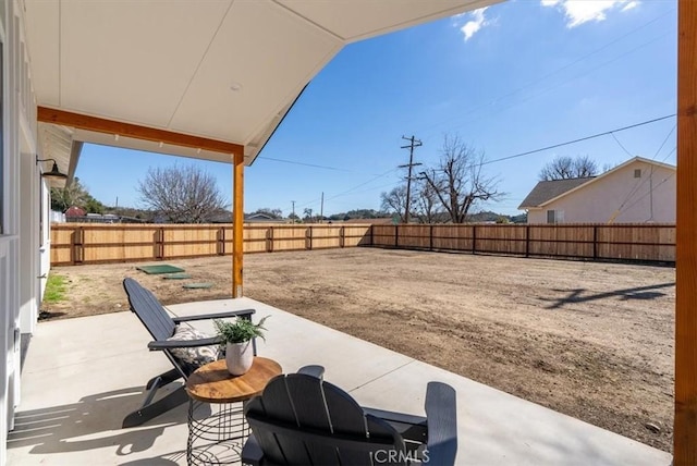 view of patio with a fenced backyard