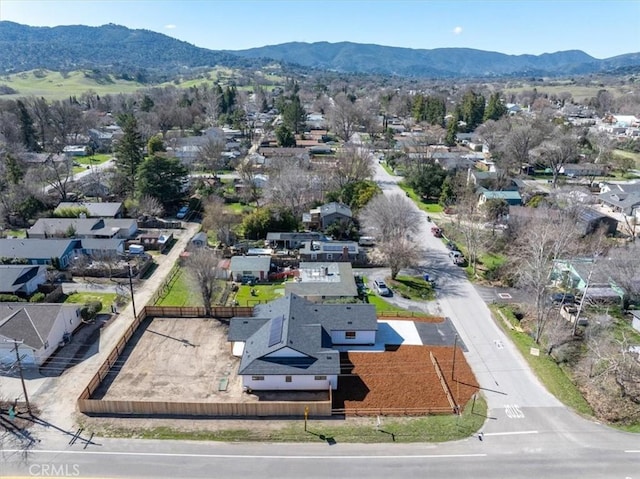 bird's eye view featuring a mountain view and a residential view