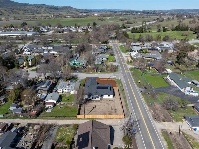 drone / aerial view with a mountain view and a residential view