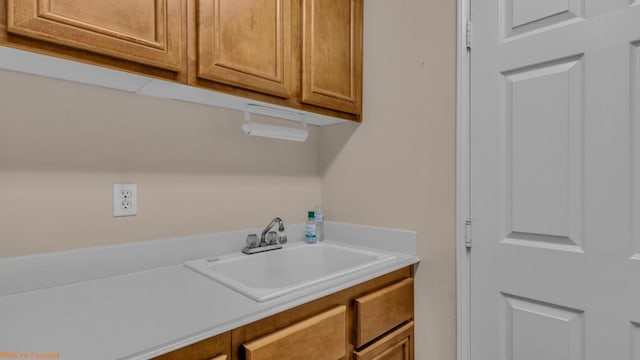 laundry area with sink