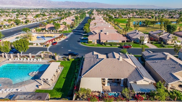 birds eye view of property featuring a mountain view