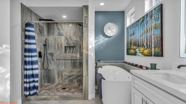 bathroom featuring vanity and plus walk in shower