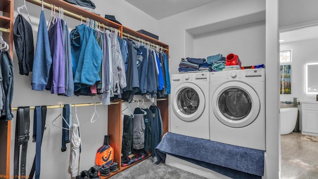 laundry room featuring separate washer and dryer