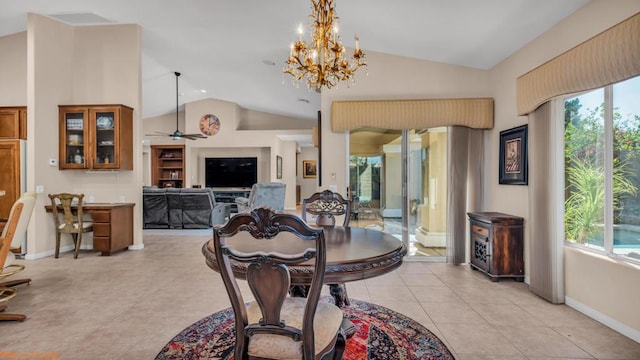 dining room with light tile patterned floors, ceiling fan with notable chandelier, and high vaulted ceiling