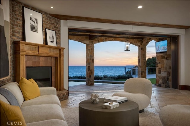 living room featuring a water view