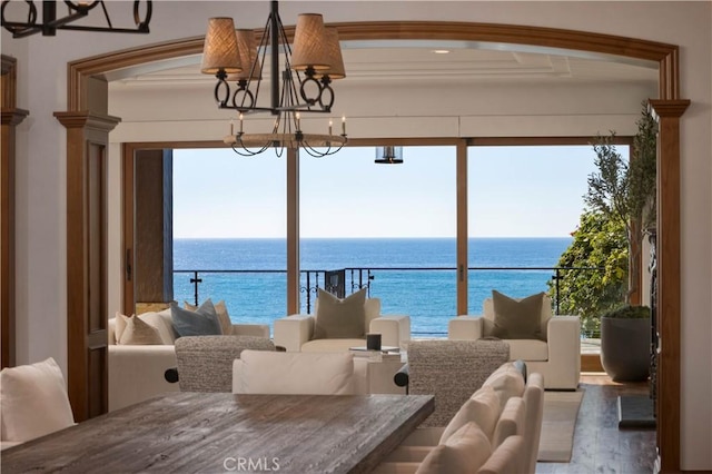 interior space with a water view and plenty of natural light