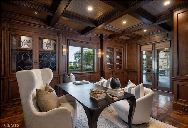 dining room with beam ceiling, ornamental molding, coffered ceiling, and wood walls