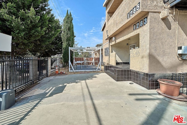 exterior space with a patio