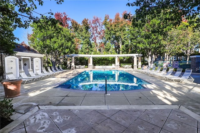 view of pool featuring a patio