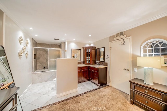 full bathroom featuring vanity, plus walk in shower, crown molding, tile patterned flooring, and toilet