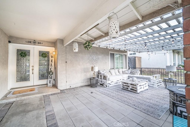 view of patio / terrace featuring an outdoor living space, a pergola, and french doors