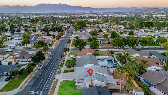 aerial view at dusk with a mountain view