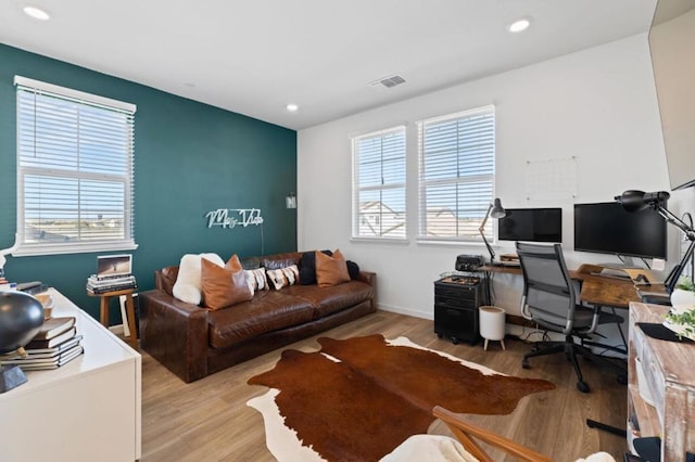 office area with light hardwood / wood-style flooring