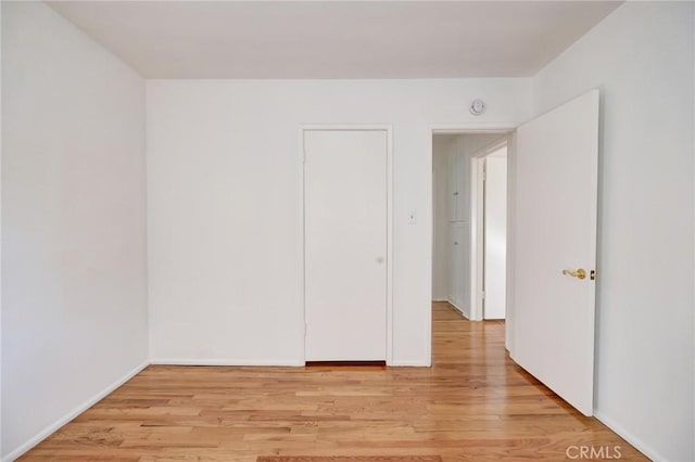 empty room with light wood-type flooring