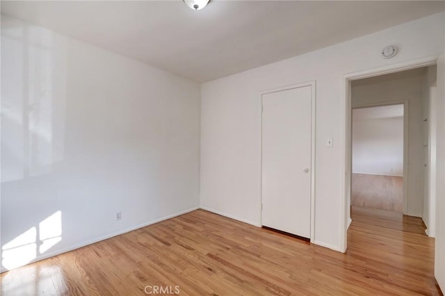 unfurnished bedroom featuring light hardwood / wood-style flooring