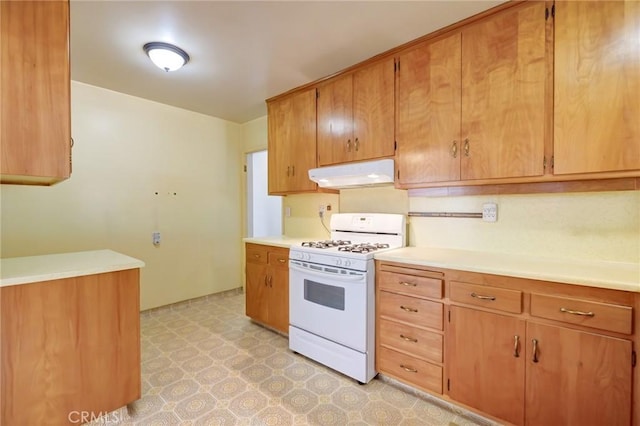 kitchen featuring white gas stove