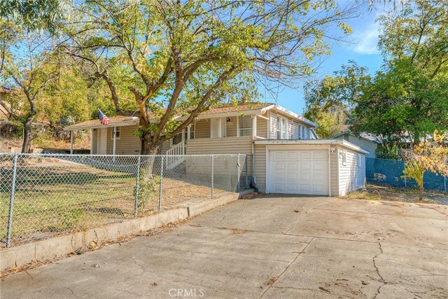 view of front of home with a garage