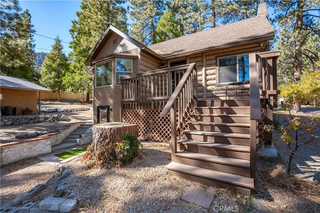 view of front of house featuring a deck