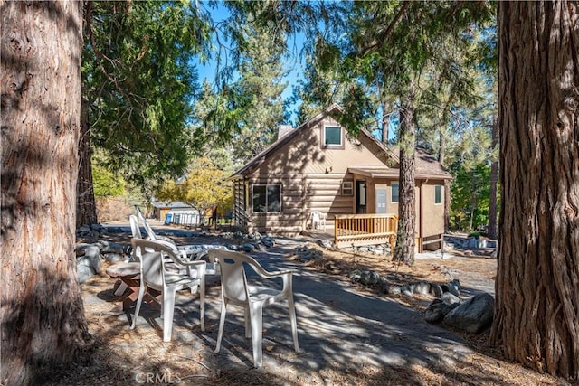 rear view of property with a patio