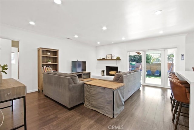 living room featuring dark hardwood / wood-style floors