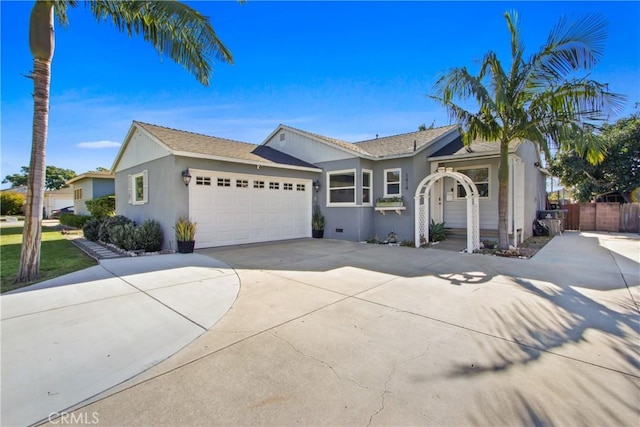 ranch-style home with a garage