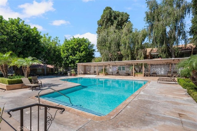 view of swimming pool featuring a patio