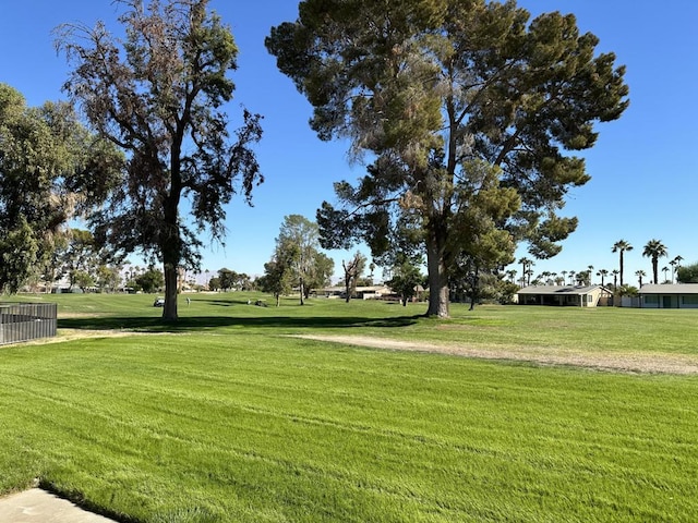 view of home's community featuring a yard