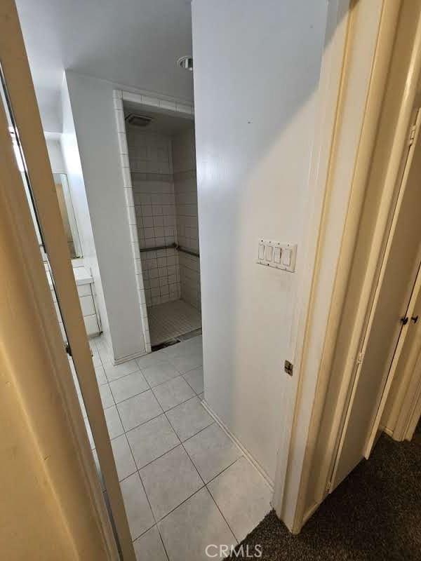 bathroom featuring tile patterned flooring