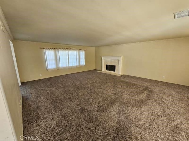 unfurnished living room featuring carpet flooring