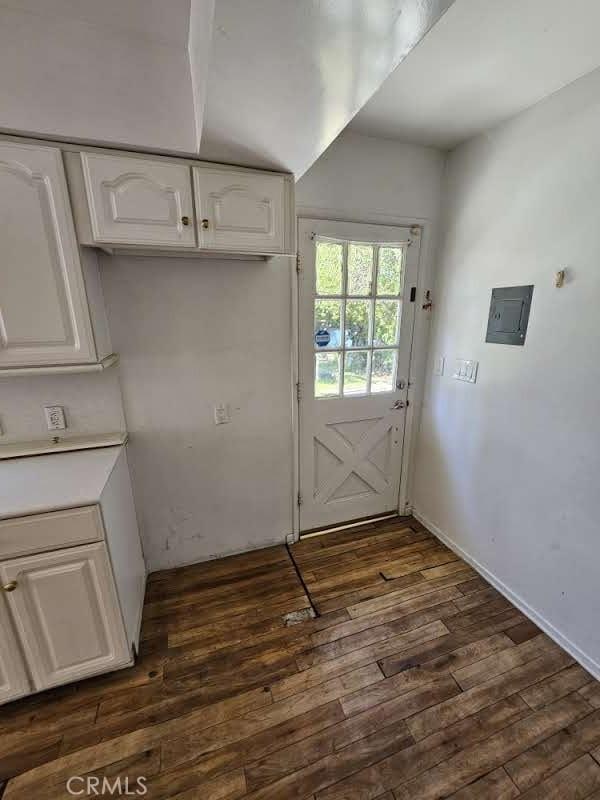 doorway to outside featuring dark hardwood / wood-style floors